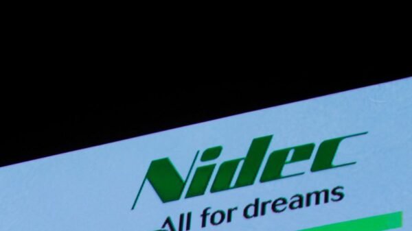 FILE PHOTO:Nidec Corp's logo is pictured at an earnings results news conference in Tokyo, Japan, July 25, 2018. REUTERS/Kim Kyung-Hoon/File Photo