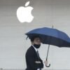 Man walks past an Apple store in Taipei, Taiwan October 20, 2020. Picture taken October 20, 2020. REUTERS/Ann Wang