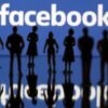 Small toy figures are seen in front of Facebook logo in this illustration picture, April 8, 2019. REUTERS/Dado Ruvic/Illustration