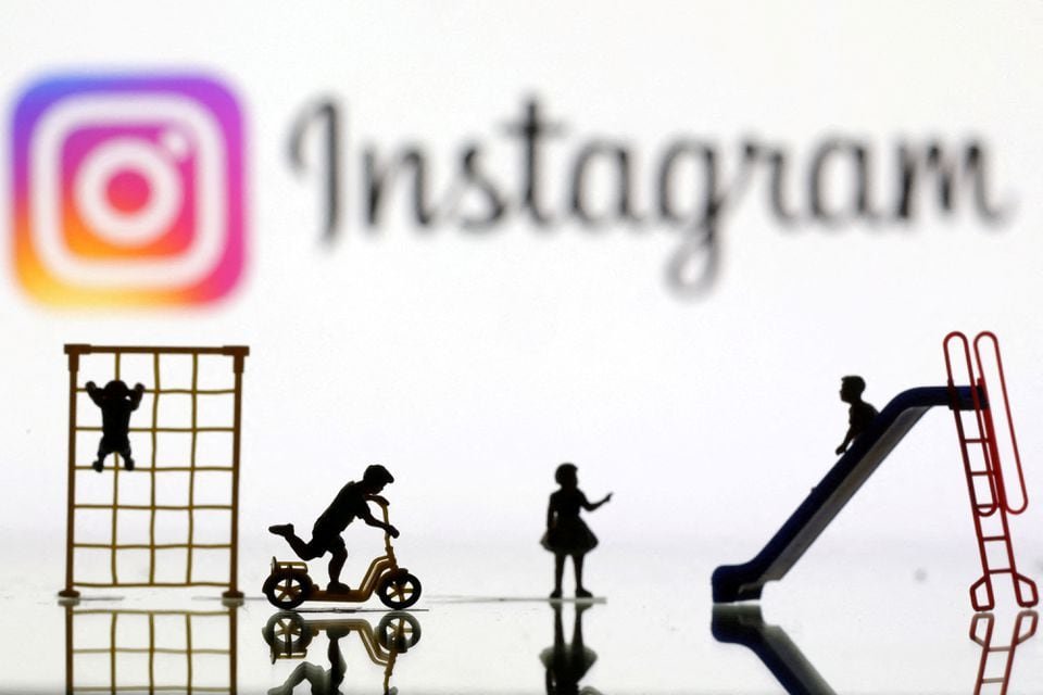 Children playground miniatures are seen in front of displayed Instagram logo in this illustration taken April 4, 2023. REUTERS/Dado Ruvic/Illustration
