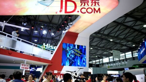 A sign of China's e-commerce company JD.com is seen at CES (Consumer Electronics Show) Asia 2016 in Shanghai, China, May 12, 2016. REUTERS/Aly Song/File Photo