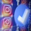 A blue verification badge and the logos of Facebook and Instagram are seen in this picture illustration taken January 19, 2023. REUTERS/Dado Ruvic/Illustration/File Photo