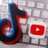 A 3D printed Youtube and Tik Tok logo are seen placed on keyboard in this illustration taken, September 15, 2020. REUTERS/Dado Ruvic/Illustration/File Photo