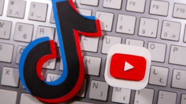 A 3D printed Youtube and Tik Tok logo are seen placed on keyboard in this illustration taken, September 15, 2020. REUTERS/Dado Ruvic/Illustration/File Photo