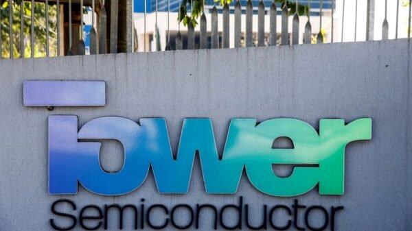 The logo of Israeli analog integrated circuits developer, Tower Semiconductor is seen at their offices in Migdal HaEmek, northern Israel, February 28, 2022. REUTERS/Amir Cohen/File Photo