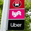 A sign marks a rendezvous location for Lyft and Uber users at San Diego State University in San Diego, California, U.S., May 13, 2020. REUTERS/Mike Blake/File Photo