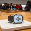 An Apple smartwatch is displayed as customers visit the Apple store in New York, U.S., December 26, 2023. REUTERS/Eduardo Munoz