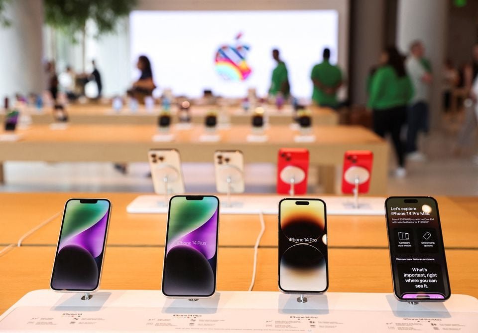 Apple iPhones are seen inside India's first Apple retail store during a media preview, a day ahead of its launch in Mumbai, India, April 17, 2023. REUTERS/Francis Mascarenhas