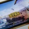 Game for Peace", Tencent's alternative to the blockbuster video game "PlayerUnknown's Battlegrounds" (PUBG) in China, is seen on a mobile phone in this illustration picture taken May 13, 2019. REUTERS/Florence Lo/Illustration