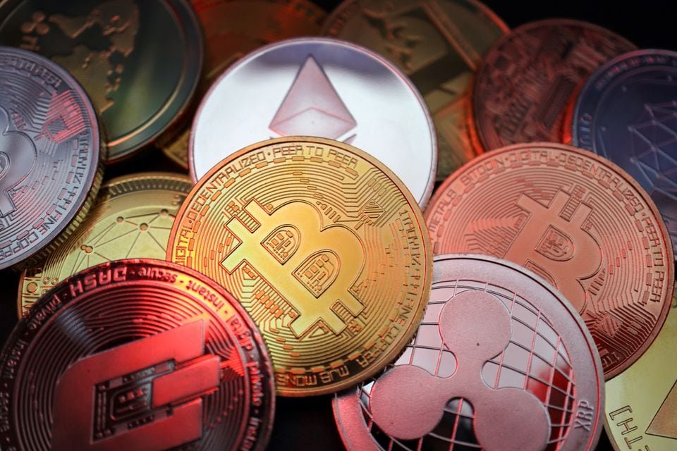 Representations of cryptocurrencies including Bitcoin, Dash, Ethereum, Ripple and Litecoin are seen in this illustration picture taken June 2, 2021. REUTERS/Florence Lo/Illustration/File Photo